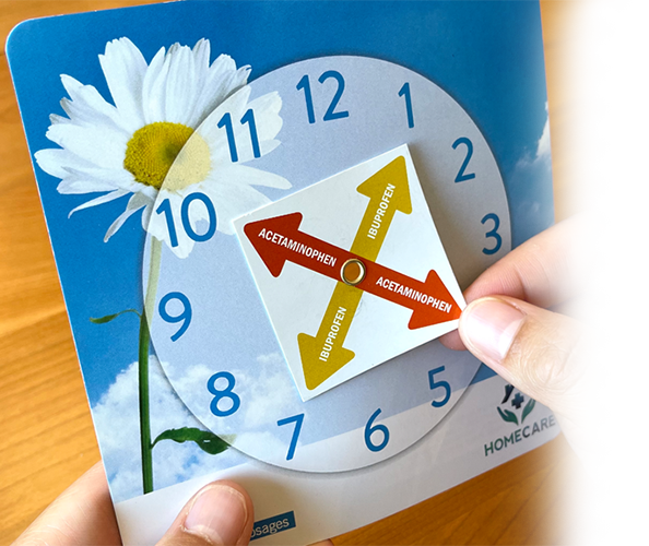 Someone holding a Comfort Control Clock 